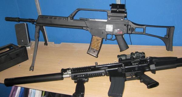 My WE G36 with my WE Scar.

The G39c was converted to a fullsized G36.
For this convertion I used:
- G&P handguard + outer barrel
- G&P stock
- long Scar Flashhider
- RA Tech 6.01mm precision inner barrel from the M14
- carry handle with scope and ACM red dot with laser

It shoots hard, it kicks hard.
No wobble in the barrel from the conversion.
Mags don't leak (I take care of my stuff) and hold a lot of gas.
System is very efficient.

Shoots around 500 fps and that is in my attic with no heating in winter time! 
So I can only guess what it will be in summer and with co2 (if they will bring co2 mags out)

All in all, very nice working and cool looking ggbr from WE! :)